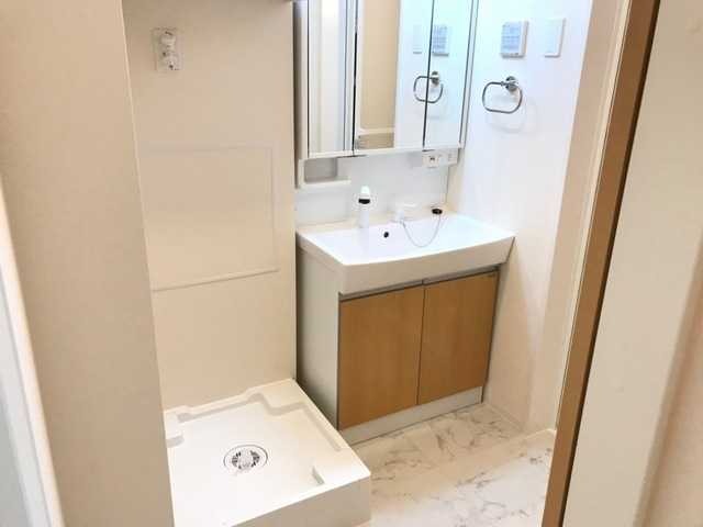 ��ʌ��@�c�s�������̃A�p�[�g�̐��ʏ�