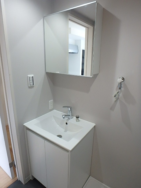 ��ʌ��������܎s�k��{�����Q���ڂ̃A�p�[�g�̐��ʏ�