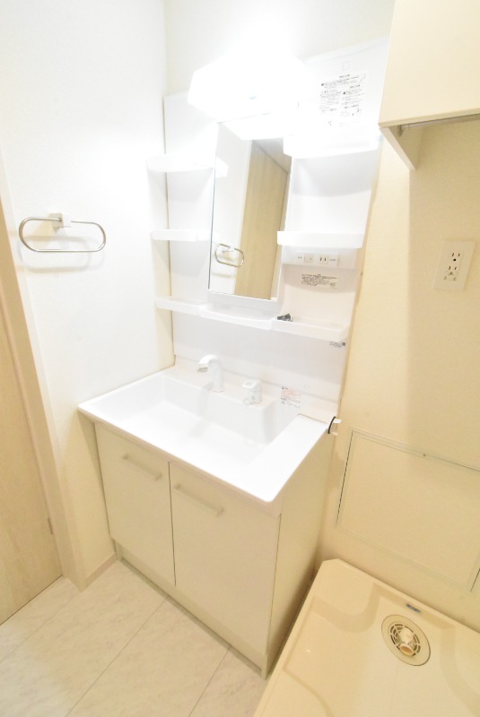 ��ʌ��z�J�s�厚�����̃A�p�[�g�̐��ʏ�