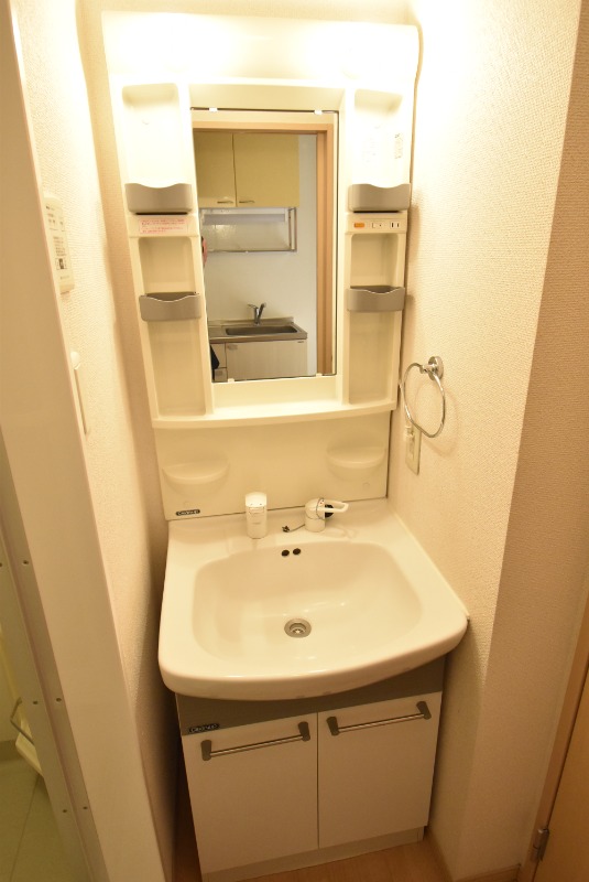 ��ʌ��������܎s��{��㏬���̃A�p�[�g�̐��ʏ�