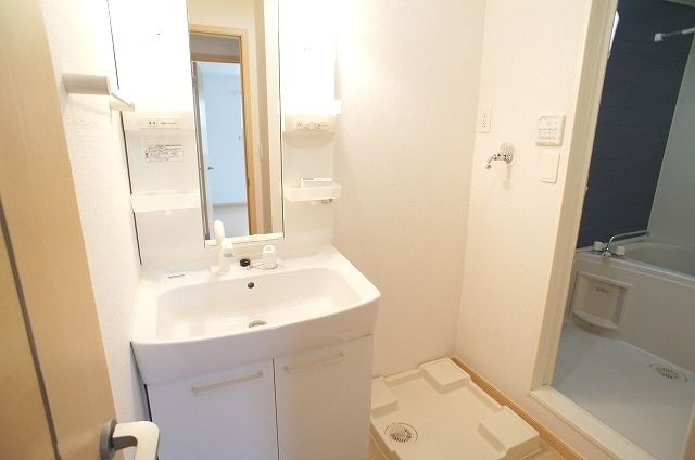 ��ʌ�����s�厚���s�g���̃A�p�[�g�̐��ʏ�