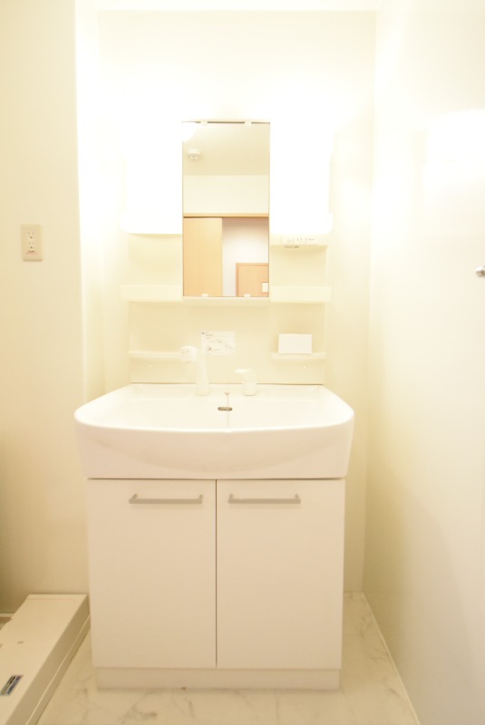 ��ʌ�����s�{���U���ڂ̃A�p�[�g�̐��ʏ�