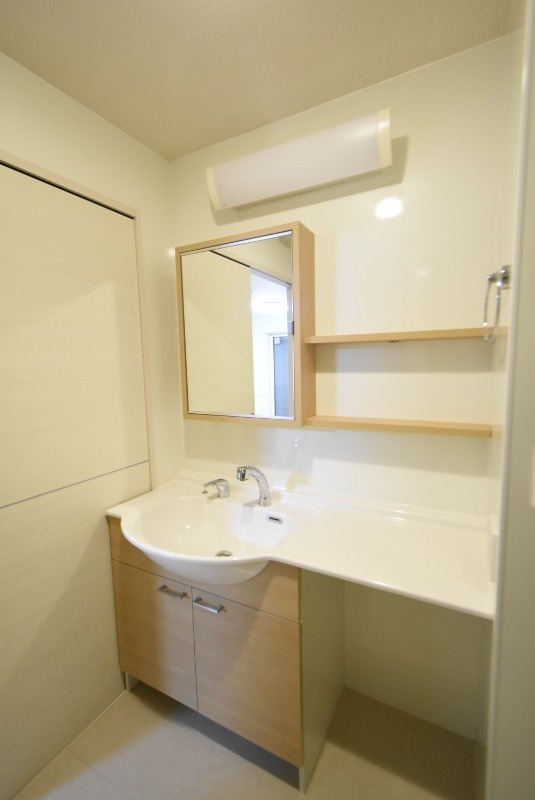 ��ʌ�����s�{���U���ڂ̃A�p�[�g�̐��ʏ�