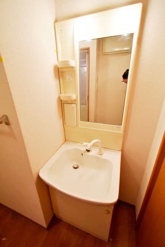 ��ʌ�����s����T���ڂ̃}���V�����̐��ʏ�