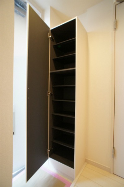 ��ʌ�����s��c�{�̃A�p�[�g�̌���