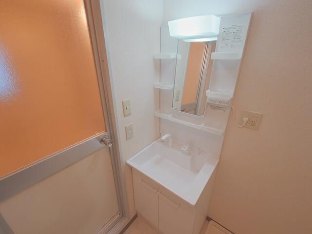 ��ʌ��������܎s��{��㏬���̃}���V�����̐��ʏ�