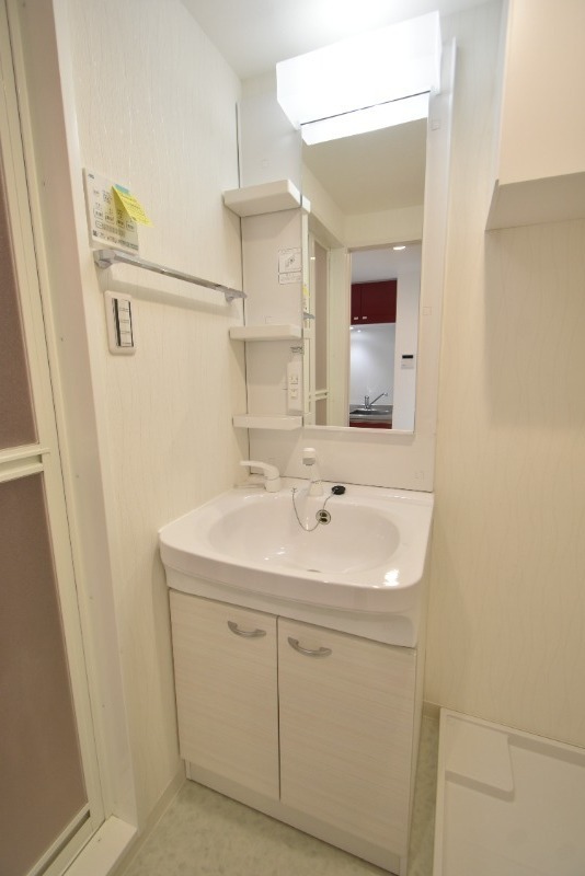 ��ʌ��������܎s�k��y�C���P���ڂ̃}���V�����̐��ʏ�