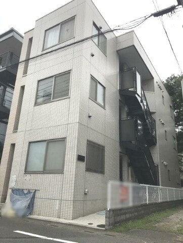 ��ʌ��������܎s��{����ؒ��S���ڂ̃}���V�����̌����O��