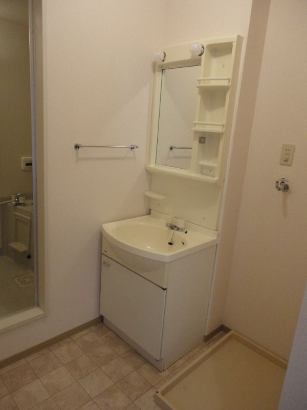 ��ʌ��������܎s�k��ʏ����̃A�p�[�g�̐��ʏ�