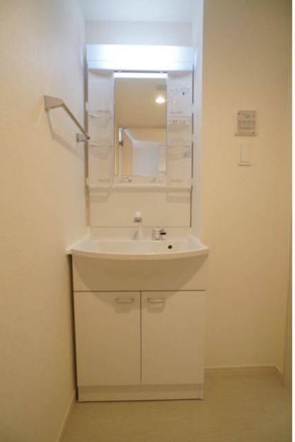 ��ʌ��������܎s�Y�a��j���J�R���ڂ̃}���V�����̐��ʏ�