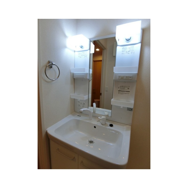 ��ʌ�����s�厚�����̃A�p�[�g�̐��ʏ�