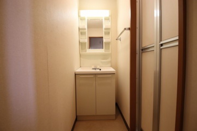 ��ʌ��������܎s��{��O���R���ڂ̃}���V�����̐��ʏ�