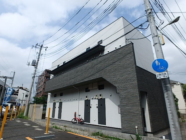 ��ʌ��������܎s�k�捡�H���̃A�p�[�g�̌����O��