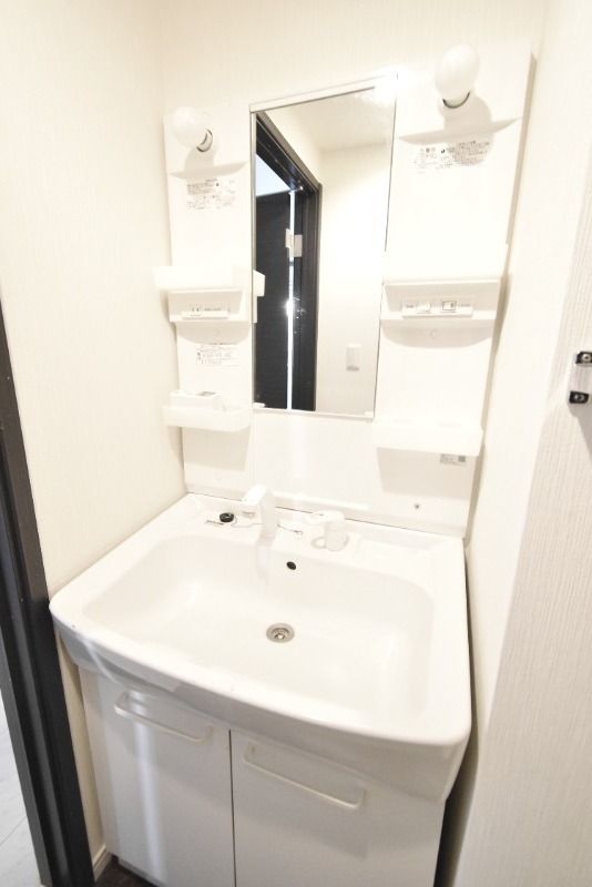 ��ʌ��������܎s��{��听���P���ڂ̃A�p�[�g�̐��ʏ�