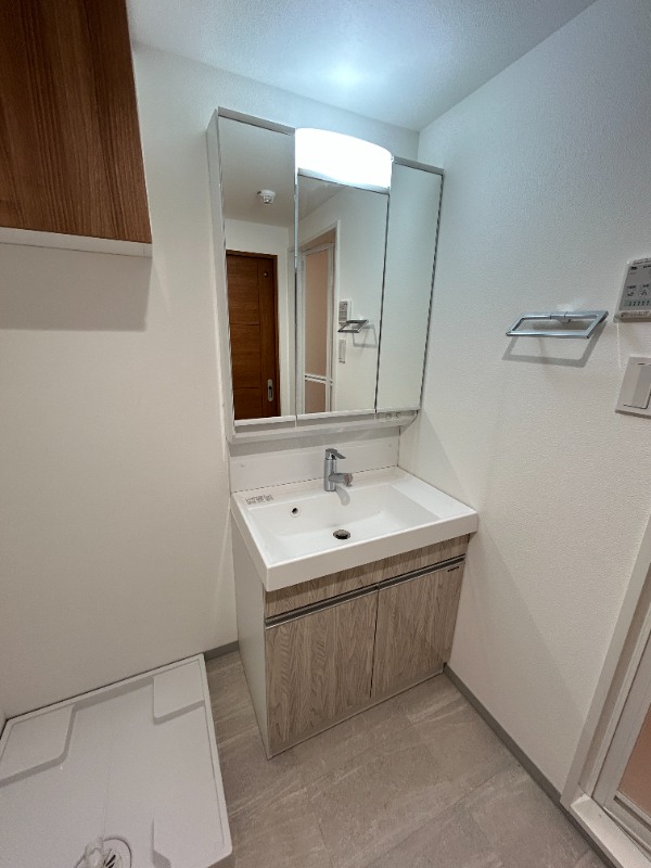 ��ʌ��������܎s�k��{�����P���ڂ̃}���V�����̐��ʏ�