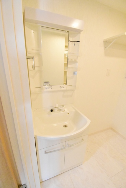 ��ʌ��������܎s�k��{�����R���ڂ̃A�p�[�g�̐��ʏ�