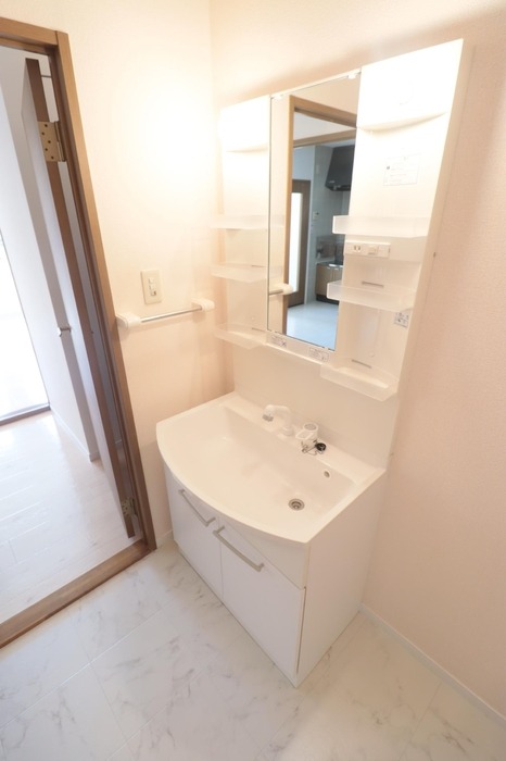 ��ʌ�����s���ȂT���ڂ̃A�p�[�g�̐��ʏ�