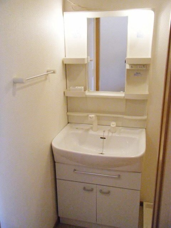 ��ʌ������s�V�����W���ڂ̃A�p�[�g�̐��ʏ�