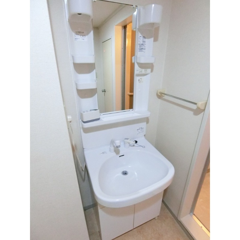 ��ʌ�����s������U���ڂ̃A�p�[�g�̐��ʏ�