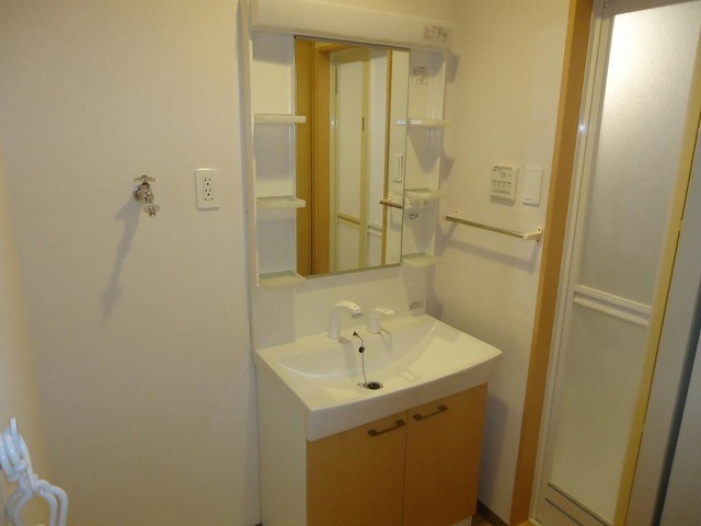 ��ʌ��@�c�s�������̃}���V�����̐��ʏ�