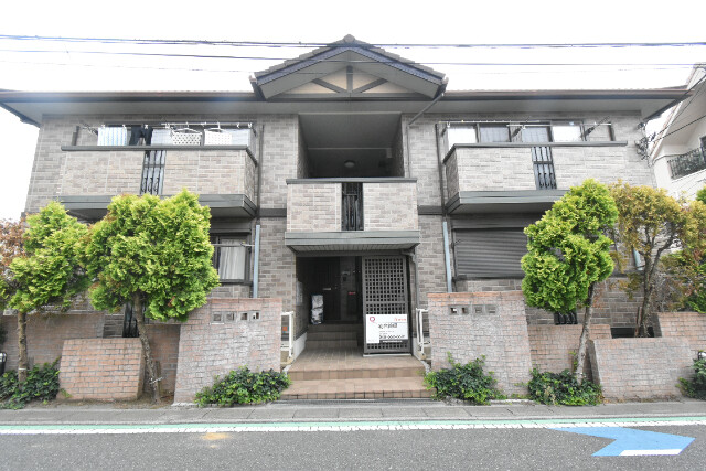 ��ʌ��������܎s�k��{�����̃A�p�[�g�̌����O��