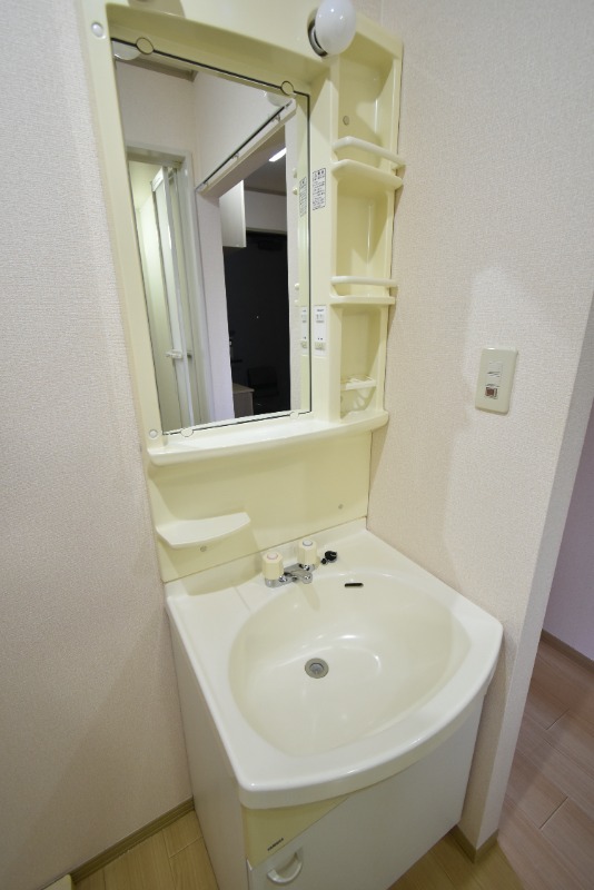 ��ʌ��������܎s�k����i���Q���ڂ̃A�p�[�g�̐��ʏ�