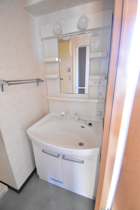 ��ʌ��������܎s�k��y�C���Q���ڂ̃}���V�����̐��ʏ�