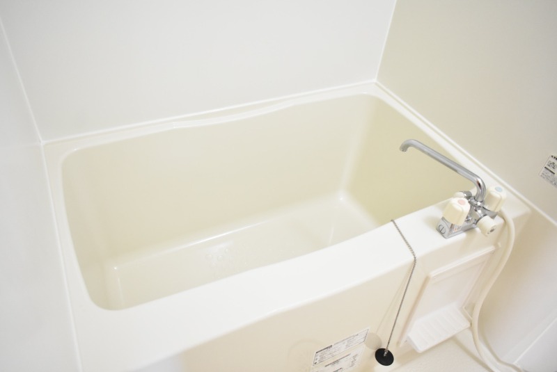 ��ʌ��������܎s�k��{�����̃A�p�[�g�̃o�X