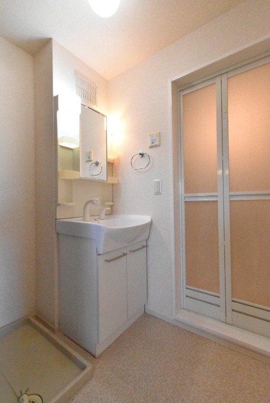 ��ʌ��z�J�s�����������̃A�p�[�g�̐��ʏ�