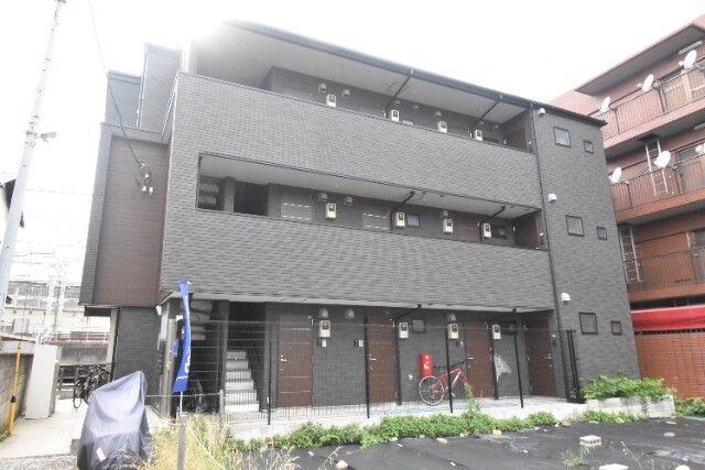 ʌ܎s{{T100-1̃Ap[ǧO