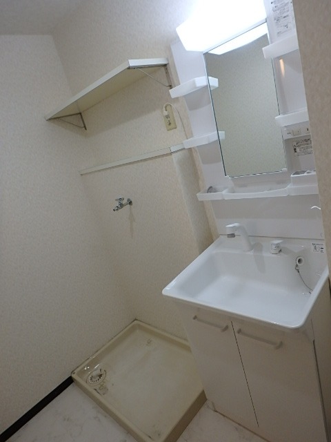 ��ʌ��������܎s��{��㏬���̃}���V�����̐��ʏ�