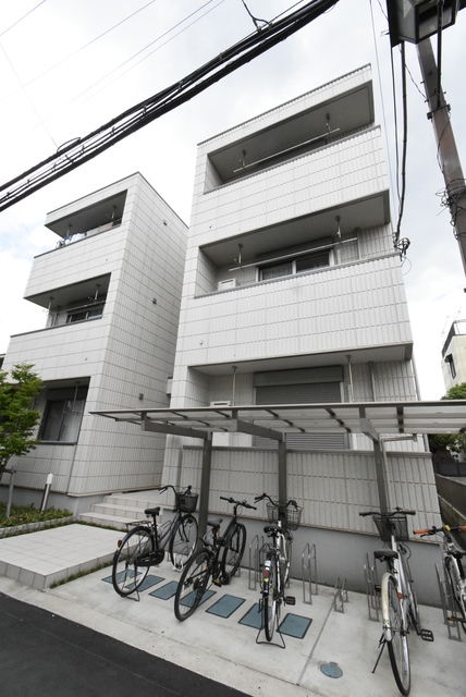 ��ʌ��������܎s��{��y�蒬�Q���ڂ̃}���V�����̌����O��