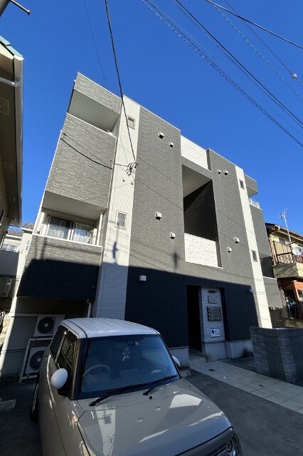 ��ʌ��������܎s������厚�V��̃A�p�[�g�̒��ԏ�