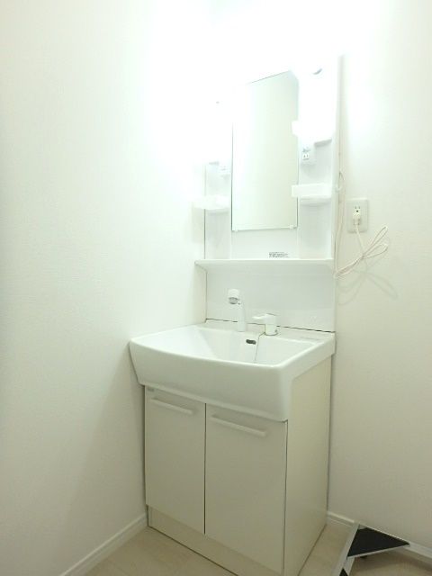 ��ʌ��������܎s��{����\���P���ڂ̃A�p�[�g�̐��ʏ�