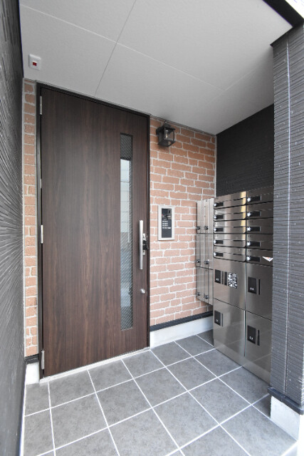 ��ʌ������s�������̃A�p�[�g�̃G���g�����X