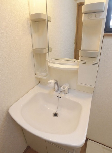 ��ʌ�����s��؂R���ڂ̃}���V�����̐��ʏ�