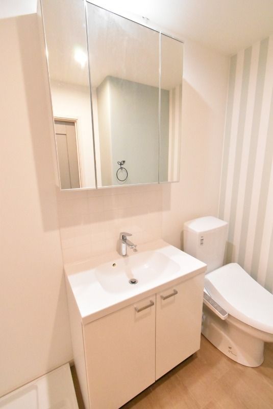 ��ʌ��z�J�s���������̃A�p�[�g�̐��ʏ�