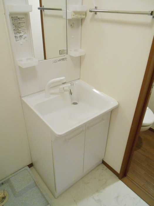 ��ʌ��������܎s�k��{�����̃A�p�[�g�̐��ʏ�