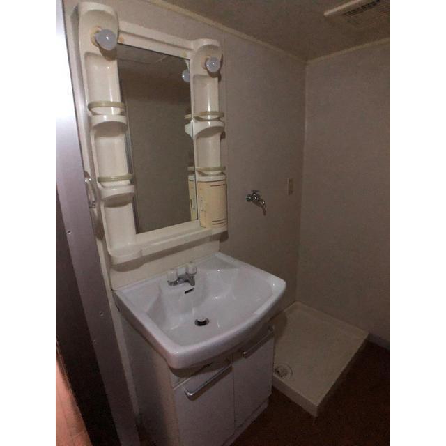 ��ʌ��������܎s��΋擌��΂R���ڂ̃}���V�����̐��ʏ�