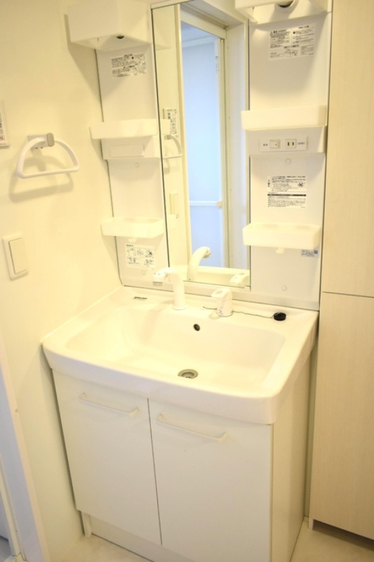 ��ʌ��������܎s�k��{�����Q���ڂ̃A�p�[�g�̐��ʏ�