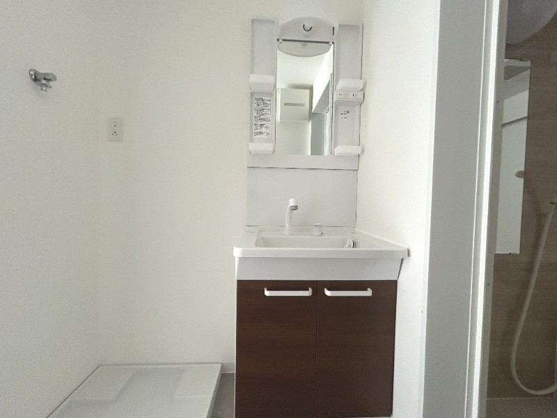 ��ʌ��������܎s�k��{�����̃A�p�[�g�̐��ʏ�