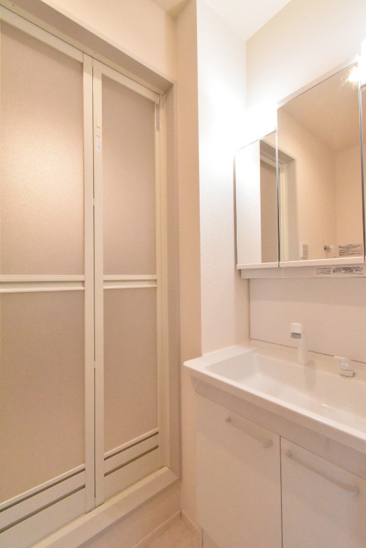 ��ʌ�����s����T���ڂ̃}���V�����̐��ʏ�