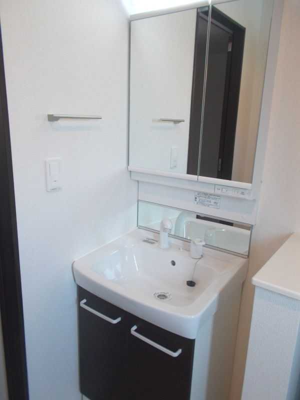 ��ʌ�����s�厚�v�ۂ̃A�p�[�g�̐��ʏ�