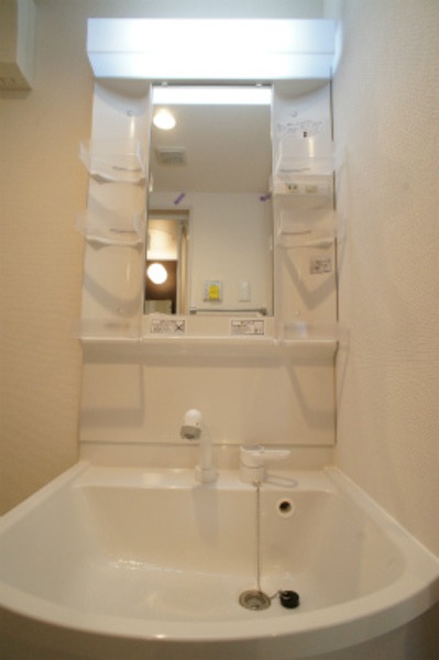 ��ʌ�����s�����R���ڂ̃}���V�����̐��ʏ�