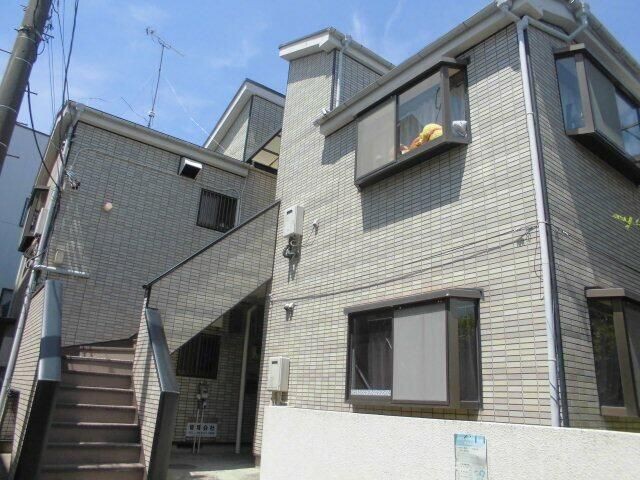 ��ʌ������s�������̃A�p�[�g�̌����O��