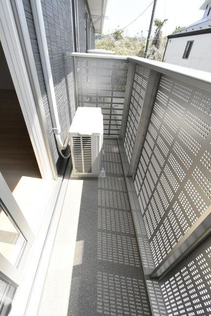 ��ʌ��@�c�s���V�h�U���ڂ̃A�p�[�g�̃o���R�j�[