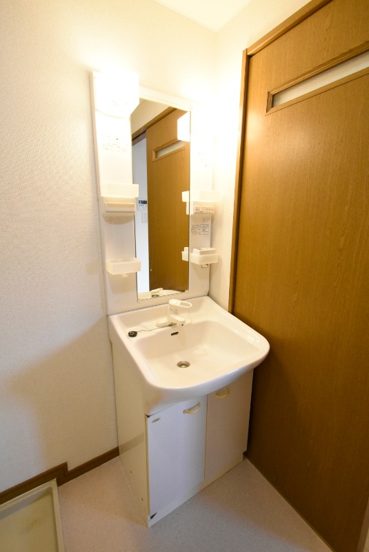 ��ʌ�����s�厚�����̃A�p�[�g�̐��ʏ�