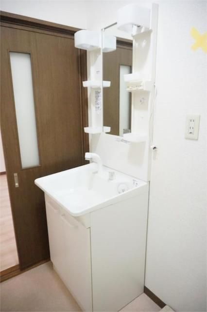 ��ʌ�����s�˒˂R���ڂ̃A�p�[�g�̐��ʏ�