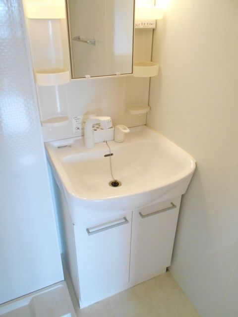 ��ʌ��������܎s�k��{�����̃A�p�[�g�̐��ʏ�