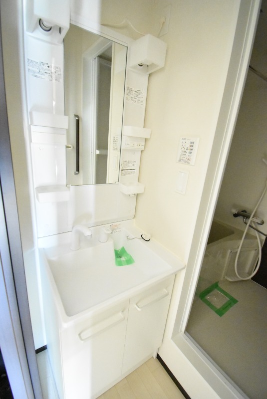 ��ʌ��������܎s��{����ؒ��S���ڂ̃}���V�����̐��ʏ�